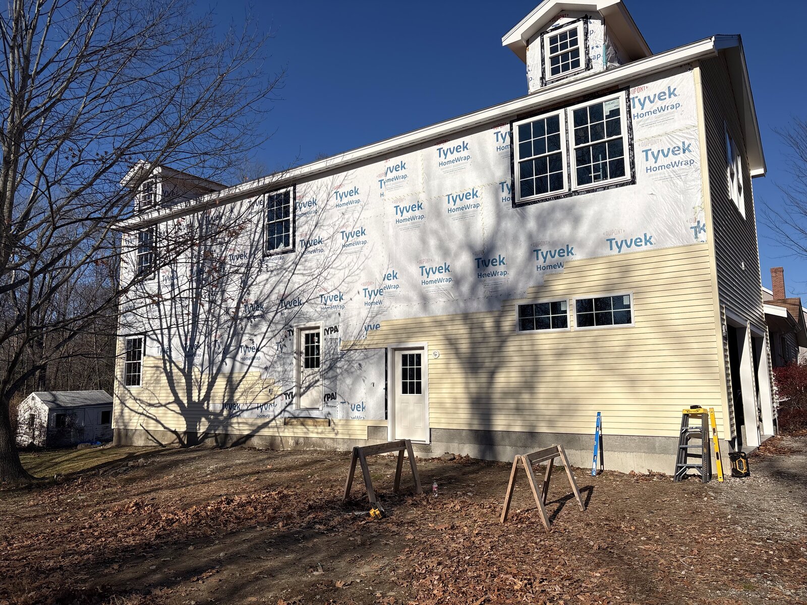 House exterior under construction by Carlino Building Associates